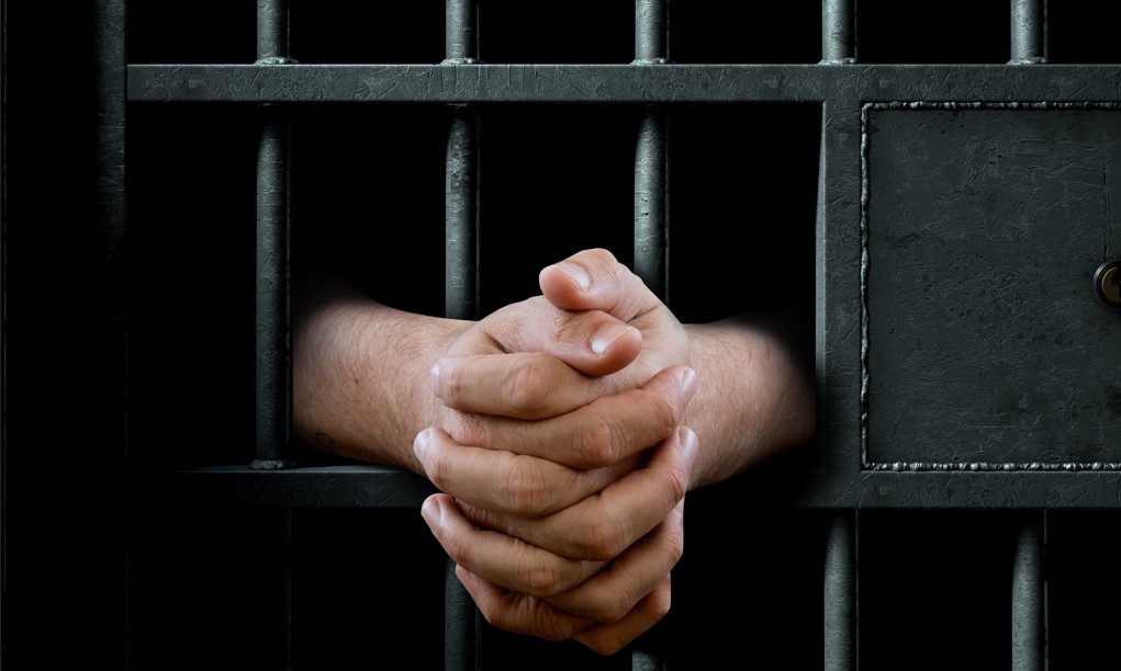 Held Behind Bars on Bail